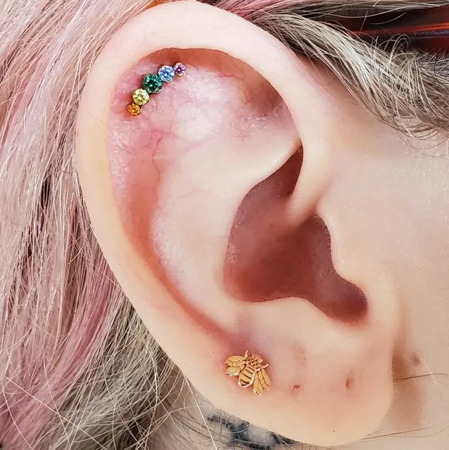 Rainbow gem ear piercing