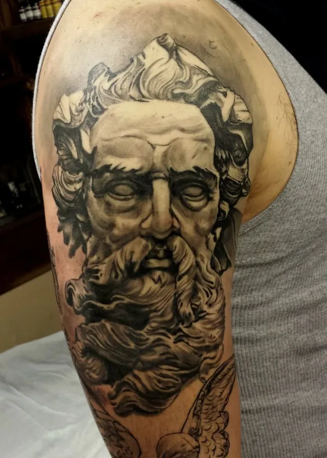 Black and grey portrait tattoo by Mission Ink